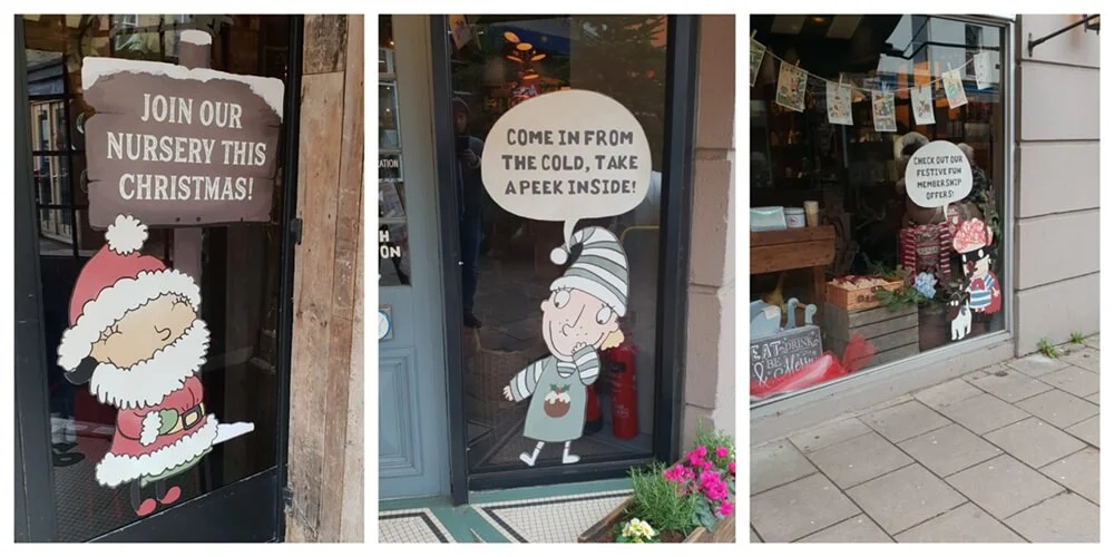 A collage of Christmas window graphics, including a little Santa, elf, and more.